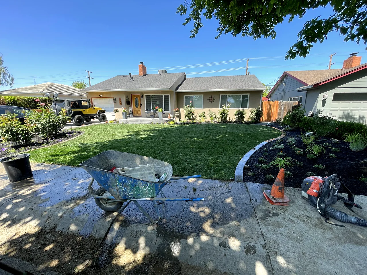 A new front lawn and planting bed, finished and watered